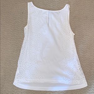 White sleeveless top
